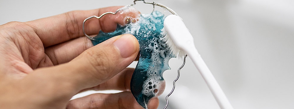 cleaning a dental retainer