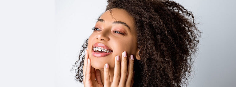 Can I get braces if I have veneers, crowns or implants?